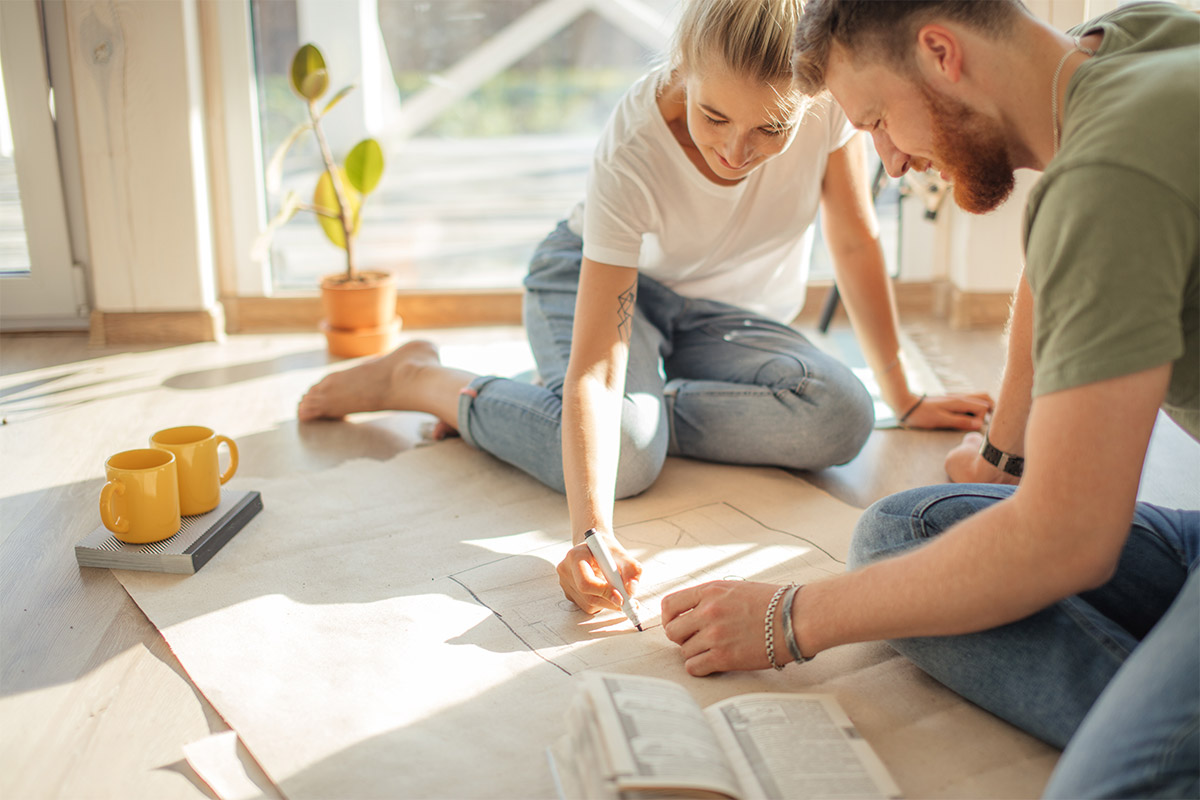 Couple Sitting on Floor Planning